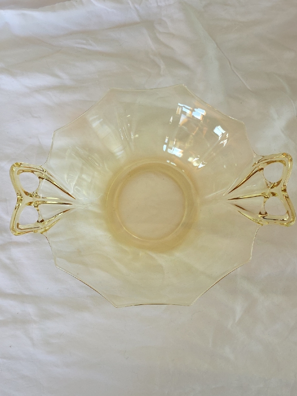 Fostoria yellow Depression glass bowl with applied bow handles.